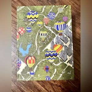 Tory Burch 100 piece wooden puzzle.